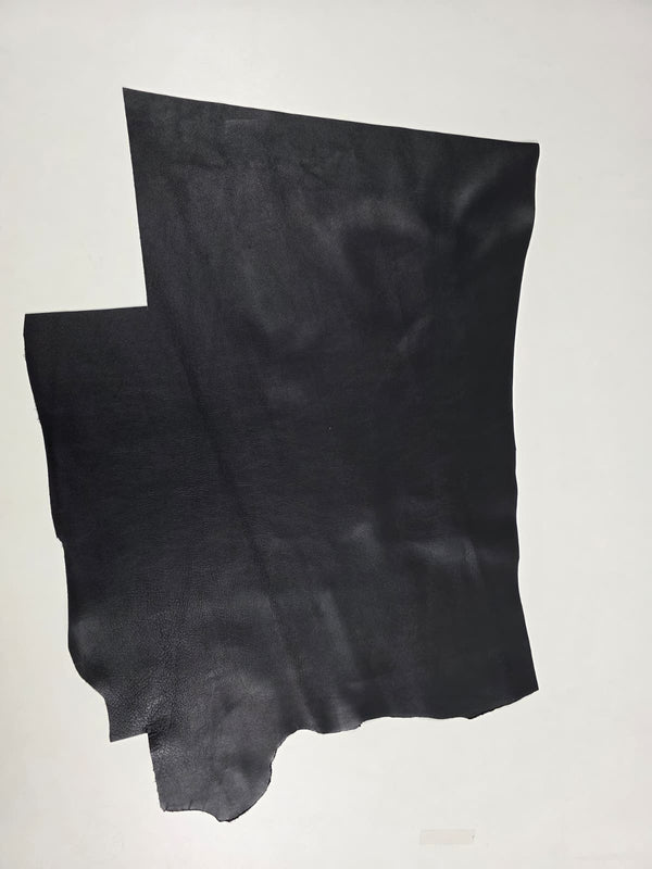 PIECE OF BLACK COW LEATHER