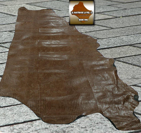 COWLEATHER EMBOSSED COCO BROWN BACKGROUND CASTELLANO REF. CO-386-2425