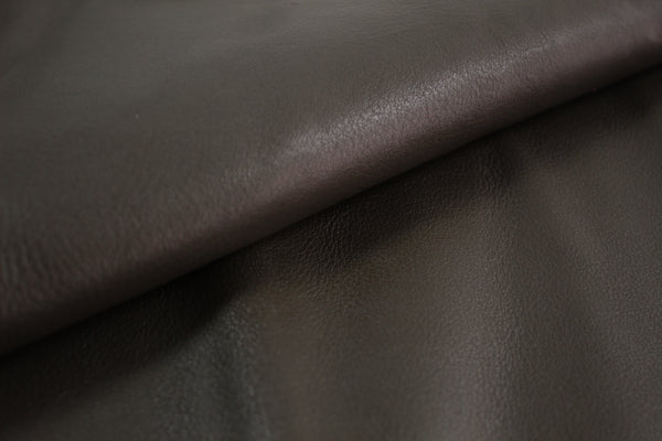 PIECE OF DARK GREEN COW LEATHER 