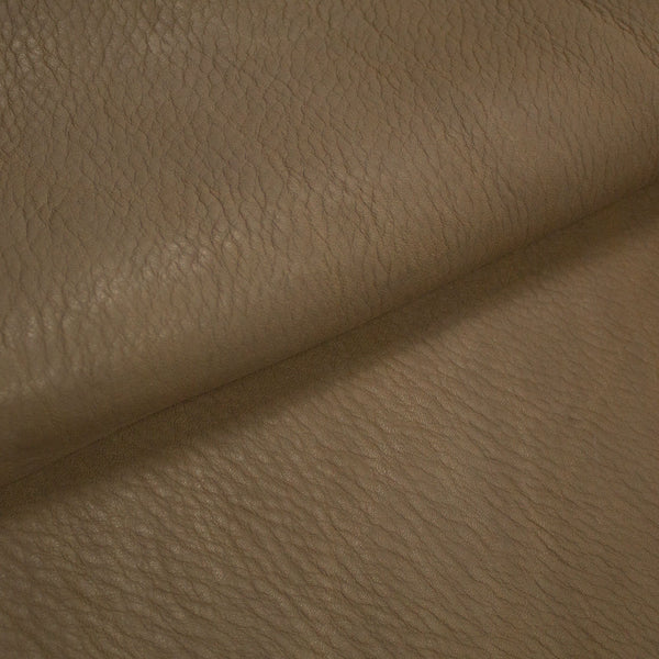 PIECE OF STONE MILLED COW LEATHER