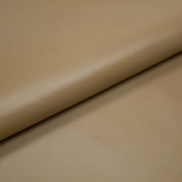 PIECE OF LIGHT BROWN COW LEATHER 