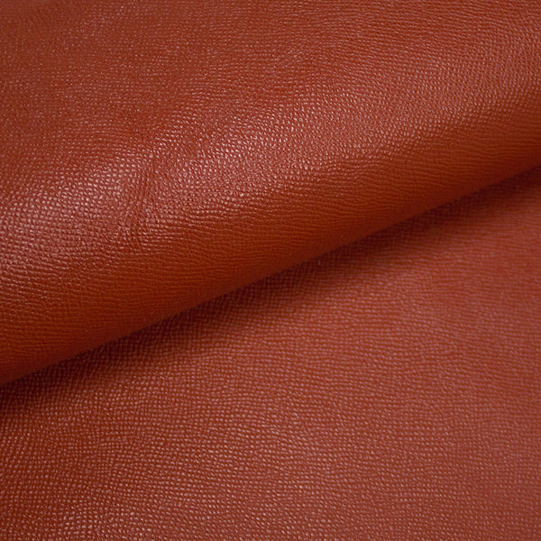 PIECE OF ORANGE ENGRAVED COW LEATHER 