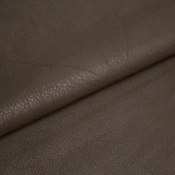 PIECE OF PUMPED MUD BROWN COW LEATHER 