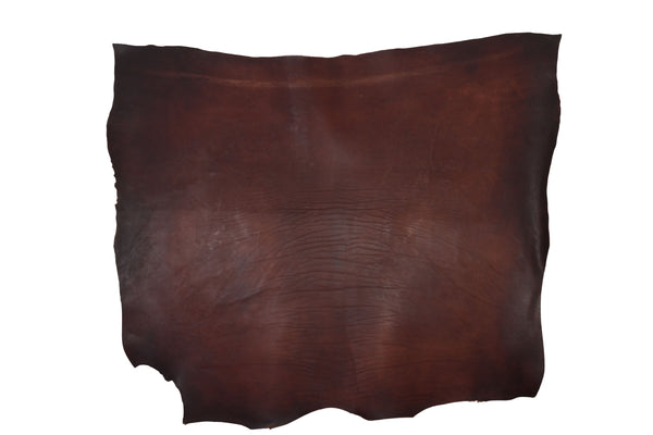 OLDED MAHOGUE PIECE OF LEATHER